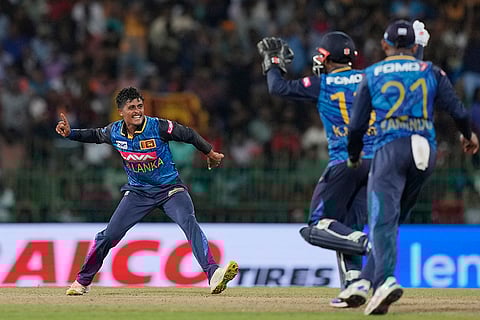 Jeffrey Vandersay celebrates the wicket of Shivam Dube